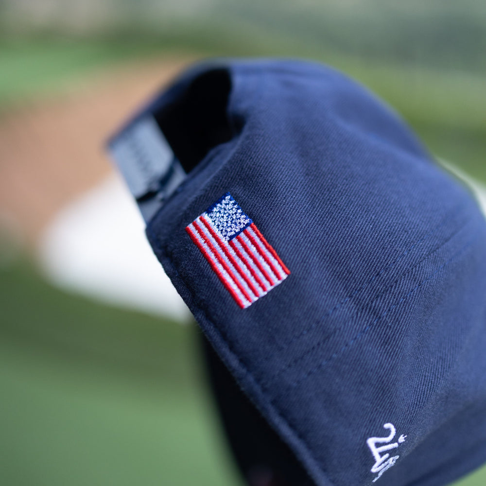 The Omega | IN GOD WE TRUST