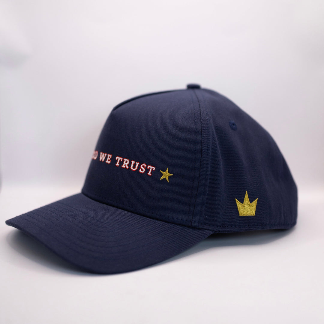 The Omega | IN GOD WE TRUST