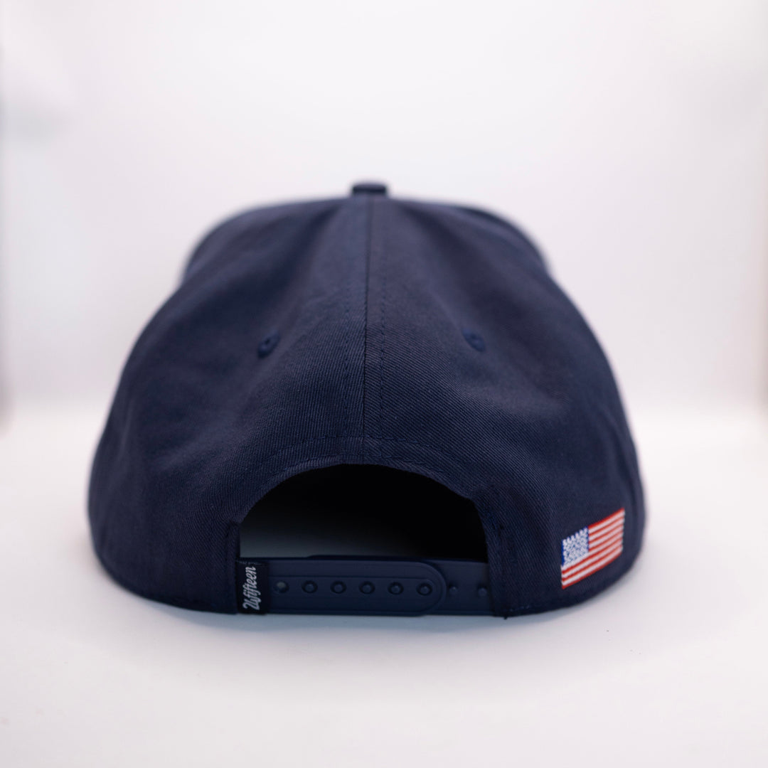 The Omega | IN GOD WE TRUST