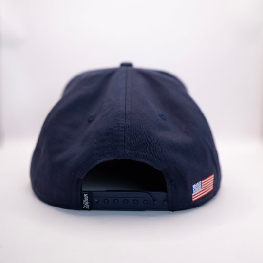 The Omega | IN GOD WE TRUST